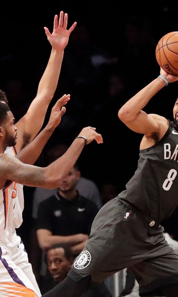 Nets bounce back, beat weary Suns 111-103